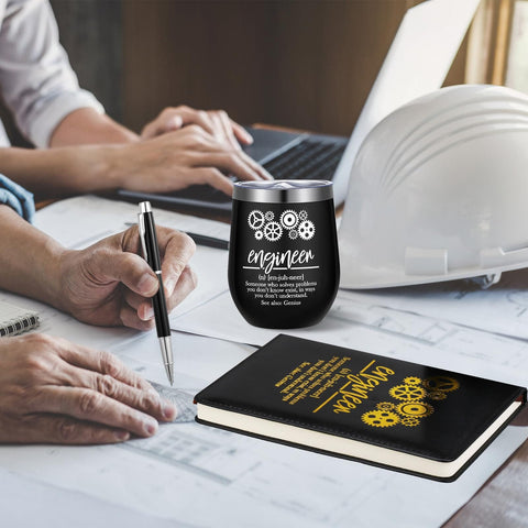 Engineers Week Gift Set For Men And Women Includes 12 Oz Stainless Steel Tumbler With Lid And Straw Socks Keychain Notebook And Pen In Gift Box For Aerospace Mechanical Electrical Civil Engineering Gearhead Approved on desk with notebook and pen.