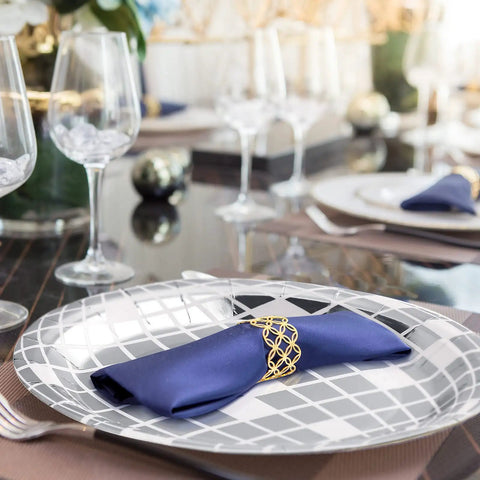 Totally Perfect 100 Pack 9 Inch Silver Disco Plates For 70s Party Decor showing elegant table setup with glasses