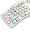 Top view of Alice Ergonomic Mechanical Keyboard With Rock Solid Aluminum Frame And Tri Mode Wireless Bluetooth Pairing Hot Swap Qmk Via Tuning with pastel keycaps.