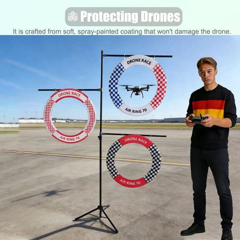 Outdoor Drone Obstacle Course Kit For FPV Racing Indoor Quadcopter Gates with rings and stand, man controlling drone nearby