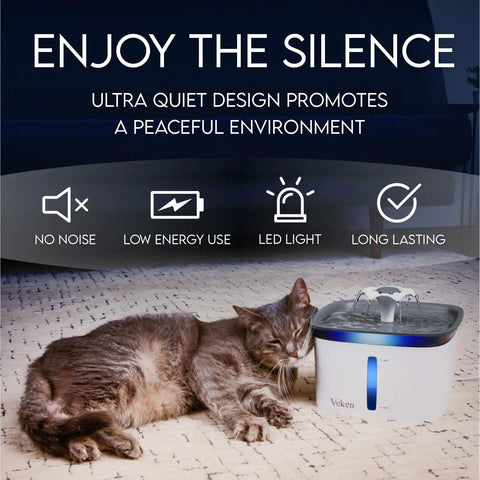 Cat sleeping beside Award Winning 95oz 2.8L Pet Fountain Automatic Water Dispenser For Cats And Dogs With Replacement Filters Included Grey