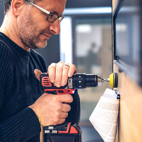 Man using drill with Heavy Duty 240 Plus 8 Pcs Sanding Discs Pad Kit For 2 Inch Die Grinder And Drill Sander Attachments