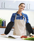 Oilproof Long Arm Sleeves For Men And Women With Heavy Duty Gunk Shielding shown on a woman cooking in a kitchen.