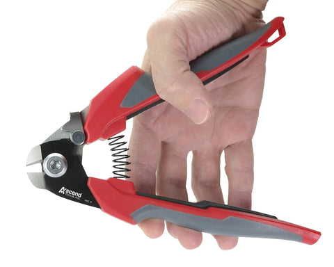 Hand holding 7 Inch Wire Rope Cutter For Railing And Cable Installations With Induction Hardened Blades, close-up view