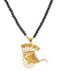 Handcrafted Gold Plated Indian Rickshaw Pendant Necklace Set With Matte Black Crystal Luxe Bead Chain detail view on white background.