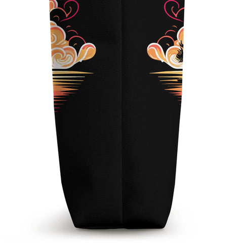 Side view of black Dragon Boat Racing Tote Bag For Festivals And Races, featuring vibrant dragon artwork on durable polyester