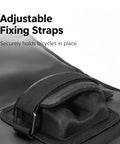 Adjustable fixing straps on a premium bike tailgate pad for Cybertruck, designed to securely hold bicycles in place.