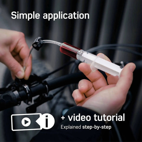 Person using All In One Shimano Hydraulic Brake Bleed Kit For Disc Brakes With 100 Ml Mineral Oil, Gloves And Bleed Block, Video Guide