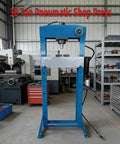 Straight Up Heavy Duty 30 Ton H Frame Shop Press Featuring Pneumatic Hydraulic Pump And Completely Welded Steel Build Crafted For Badass Garage Jobs With Rock Solid Zero Flex Action in workshop interior.