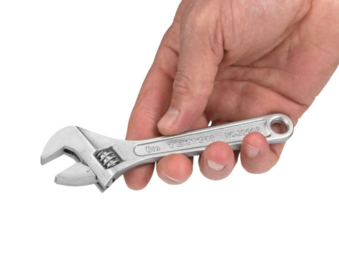 Twelve Inch Adjustable Wrench With Drop Forged Carbon Steel, Heat Treated, Satin Chrome Finish held in hand showing details.