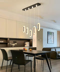 60W Dimmable LED Pendant Chandelier With Remote Control over modern dining table, 5-light black fixture, adjustable height, 3000K-6500K white