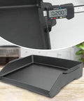Close-up of a 17 by 13 inch cast iron griddle for gas grills and stovetops, showcasing thickness and matte surface texture.