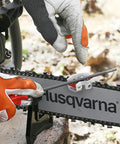 Using Three Eighths Lo Pro Pitch Chainsaw Filing Kit With Handle, Combination File Guide, Flat And Round Files on Husqvarna chainsaw