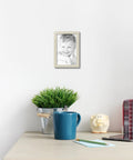 Fresh White Wooden Photo Frame 8X12 Inch Ready To Hang Clean Wall Decor With Crystal Clear Glass showcasing a cheerful child.