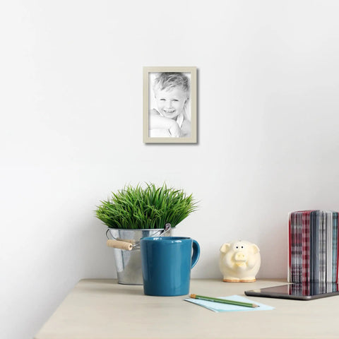 Fresh White Wooden Photo Frame 8X12 Inch Ready To Hang Clean Wall Decor With Crystal Clear Glass showcasing a cheerful child.