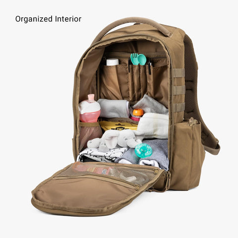 Organized interior of MOLLE Compatible Diaper Backpack for Dads With Built-In Changing Mat And Stroller Straps, Rugged 600D Daypack.