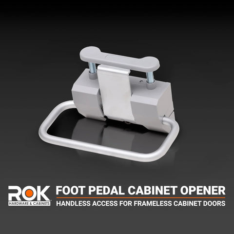 Hands-Free Foot Pedal Cabinet Opener For Frameless Cabinet Doors, compact silver design for kitchens and workshops.