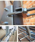 Close-up of 304 stainless steel square U-bolts clamping boat trailer rails. Six Pack Square U Bolts 3/8 Inch Thread, 4 Inch Inner Width, 7 Inch Overall Length.