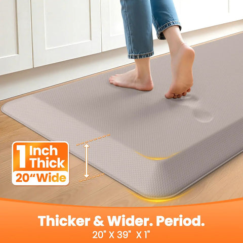 Ultra Thick 1 Inch Anti Fatigue Kitchen Mat 20 By 39 Inches Non Slip Waterproof Floor Mat For Standing Desk Kitchen Sink And Home Office Khaki Perfect For Countertops And Long Meal Prep Sessions, showing foot pressing on mat surface