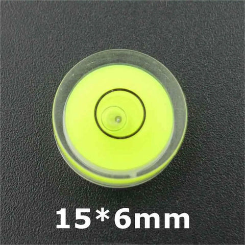 100 pcs Multisize Circular Spirit Level Bubble Level, round 15*6mm, bright yellow color, ideal for leveling tasks.