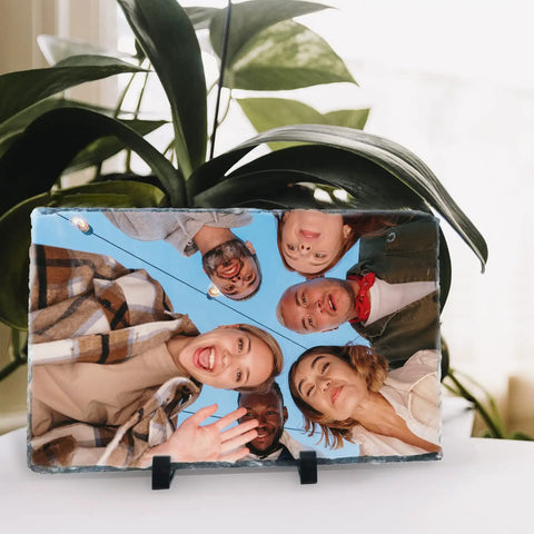 Two Pack 11.46x7.48 Inch Rectangle Sublimation Slate Frames With Stand displaying a group photo with a leafy background
