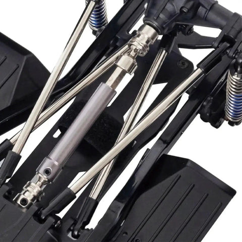 Close-up of 313mm Wheelbase Nylon Crawler Chassis Kit with front and rear axles and 2 speed transmission for RC crawlers.
