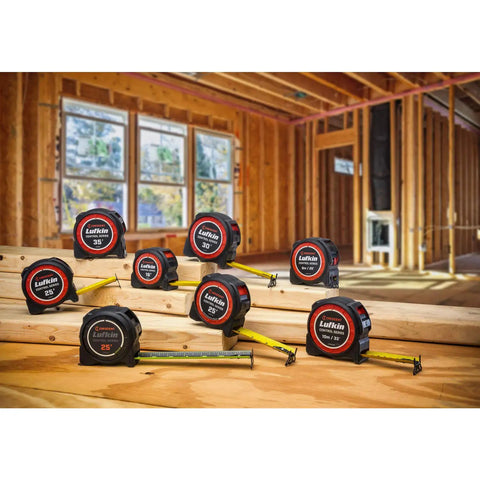 Display of various tape measures in a construction site, including One And Three Sixteenths Inch By Sixteen Foot Tape Measure with yellow clad.