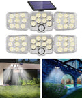 Two Pack Solar Motion Lights Outdoor With Remote Control, Lit Solar Flood Lights illuminating porch and garden at night