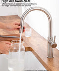 High Arc Kitchen Faucet With Pull Down Sprayer and Magnetic Docking Brushed Nickel Finish in use filling pitcher