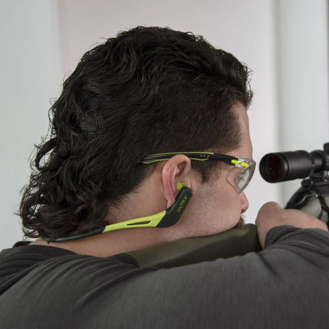 Person using Wave Banded Ear Plugs With Flexible Neckband For Easy Access Gray Yellow Noise Reduction To 22dB Solid Hearing Protection For Work