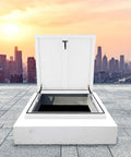 Rock Solid White Roof Access Hatch With Lockable Handle And Gas Struts Aluminum Galvanized Steel Maintenance Door opening on flat roof.