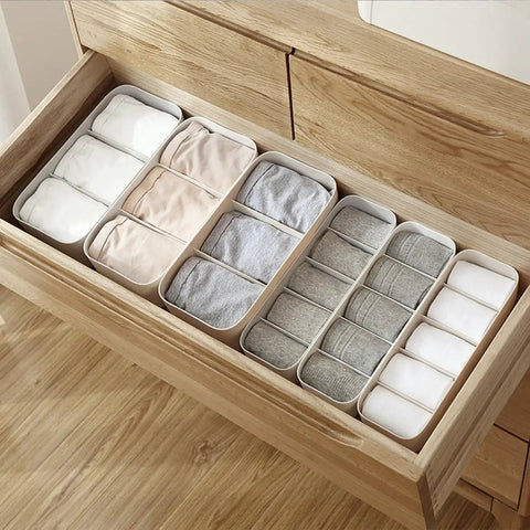 3 Piece Stackable Storage Box Set With Dividers For Bras And Leggings Multi Compartment Drawer Organizer Bin For Underwear Socks Plus Neck Ties organized with socks and leggings in a neat drawer.