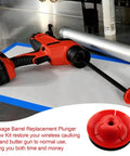 No Hassle 2 Set Grease Gun Plunger Screw Kit 44 70 0375 for 20 Oz Sausage Barrels, red plunger and cordless tool on workspace.