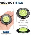 Nexarelle 6pcs Round Bubble Level D:48.9mm, H: 9.2mm Black Green in hand, showing size and detail.