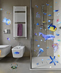 Underwater Ocean Wall Decals Set With 116 Pieces Marine Animals For Nursery Kids Bedroom Living Room And Bathroom Peel And Stick Removable Wall Art In Cute Bright Colors displayed in a bathroom