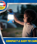 Child holding PAW Patrol Kids LED Lantern Batteries Included Easy To Use For Camping Backyard Games And Nighttime Explorations