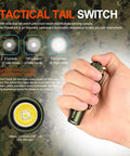 Hand holding Pokelit AA Rechargeable Mini EDC Flashlight With Clip 550 Lumens High CRI 90 LED For Camping Hiking And Everyday Use