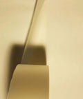 Close-up of Two Inch By Zero Point Zero One Five Inch By One Hundred Foot Urethane Die Protection Film for press brake jobs.