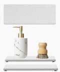 Two Pack Beige Diatomite Soap Dryers Rapid Absorbing Countertop Organizers with pump and brush on two trays.