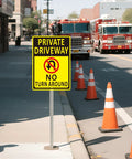 Two 14x10-inch yellow aluminum driveway signs on long stakes, reading Private Driveway No Turn Around.