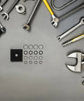 Kickass 17 Piece Impact Wrench Retaining Ring Kit With O ring Anvil Tool arranged on a gray surface, featuring sockets and tools.