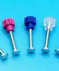 Drop In Hardware Upgrade For Plastic Pet Carriers And Portable Dog Crates Featuring Sixteen Bad Boy Seven Eighth Inch Steel Bolts Matched With No Sweat Blue Thumb Screws That Snap Tight Without A Single Fuss, colorful thumb screws with steel shafts.