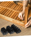 Person assembling furniture with 12 Piece Wrench Storage Rack Set Modular Organizer For Wrenches And Tools Tool Box Holder nearby