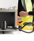 Worker demonstrating 10 Ton Hydraulic Knockout Punch Kit With Half Inch To Two Inch Conduit Die Set Puncher Six Dies Step Drill Bit Carrying