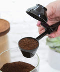 EZ Scoop Coffee Scooper And Funnel For Reusable K Cup Pods, Two Tablespoon Capacity, Mess Free Scoop And Dispense in use