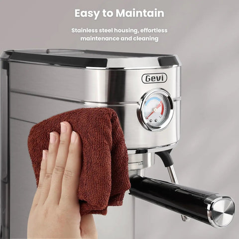Stainless steel Barista Grade Home Espresso Machine With 20 Bar Pump And Milk Frother being cleaned with a cloth