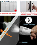 Hidden Magnetic Cabinet Locks Set With Ten Locks And Two Keys For Baby Proofing Cabinets And Drawers Featuring Invisible Design Built In Lighting Function And No Tools Required For Quick Easy Installation Fits Most Cabinet Doors And Drawers - hand using lighted key fitting on cabinet within 1.5 inch thickness