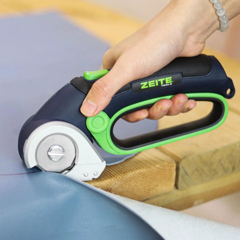 Zeite 4 V Cordless Electric Scissors Cardboard Cutter With Two Blades Storage Box Usb Charging Cable Power Rotary Cutter in use on fabric.