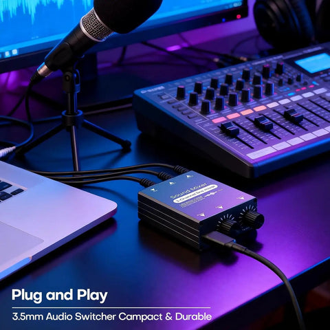 Two Channel 3.5mm Stereo Audio Mixer With Dual Volume Knobs Aluminum Shell 2 In 1 Out connected to laptop and audio gear