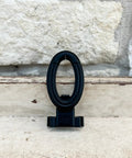 Rodeo Breakaway Honda Black Single Durable ABS Plastic Easy Snap In Place No Rope Cutting Device on wooden surface
